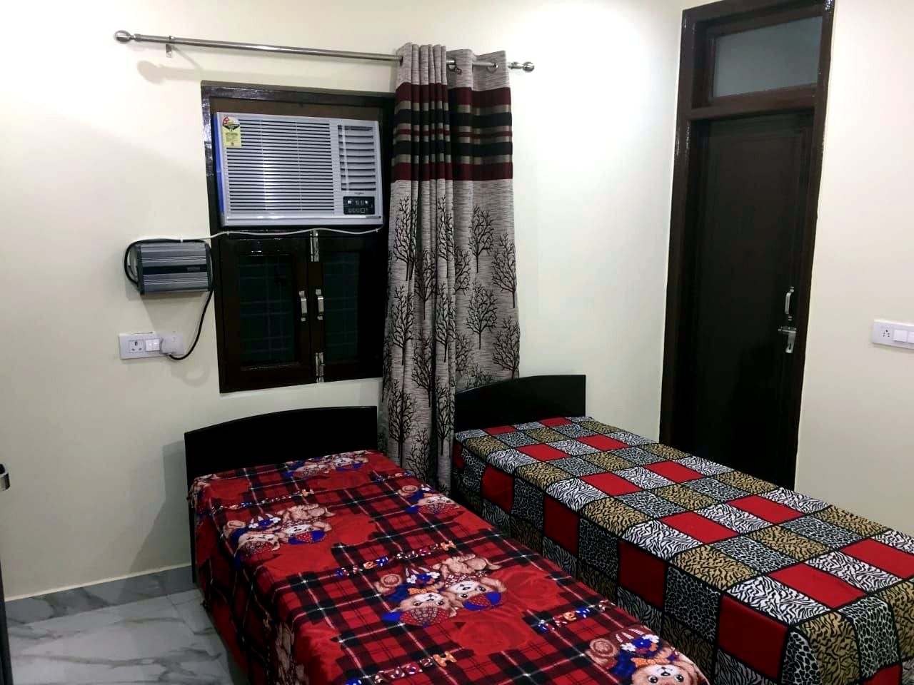 Room at Star Stayz Sector 15